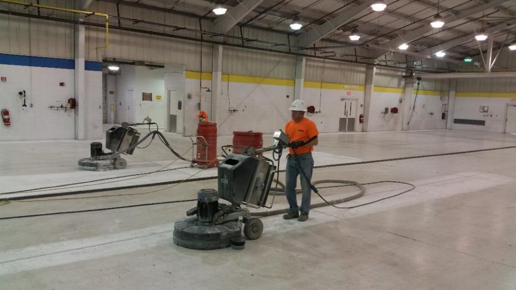 State of the art surface preparation equipment for concrete floors using Diamond Grinding